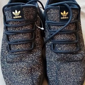 Adidas Black and Gold tubular shadow J 8.5w/7y